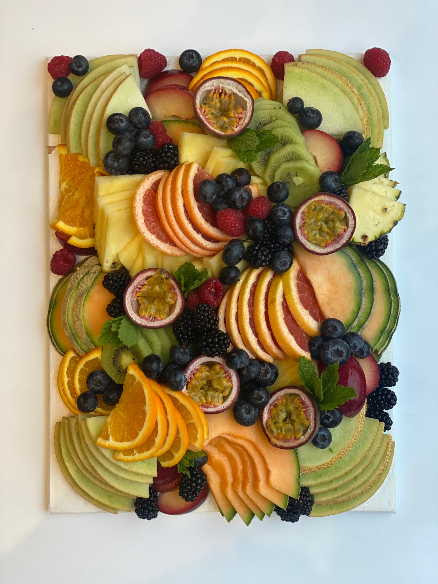 Seasonal fresh fruit platter arranged for afternoon tea