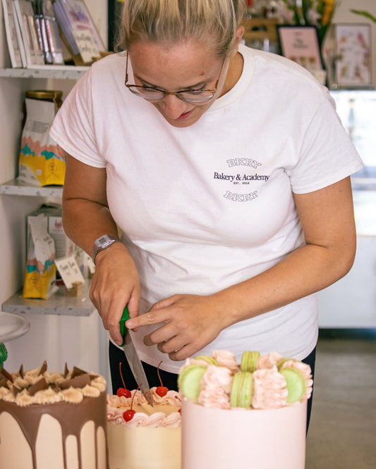 woman cutting  cake