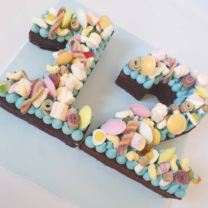 Loaded Brownie Numbers covered in toppings for milestone birthdays