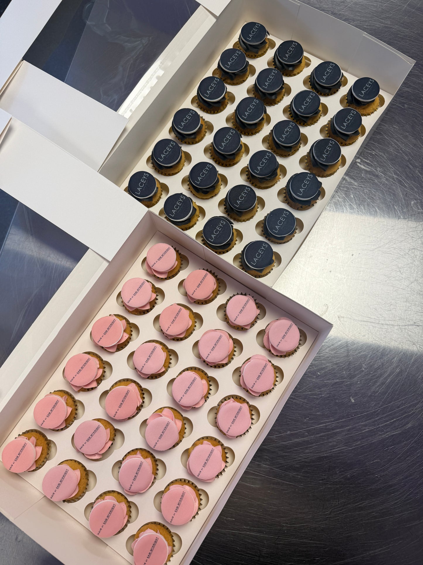 Branded mini cupcakes displayed for a brand activation event
