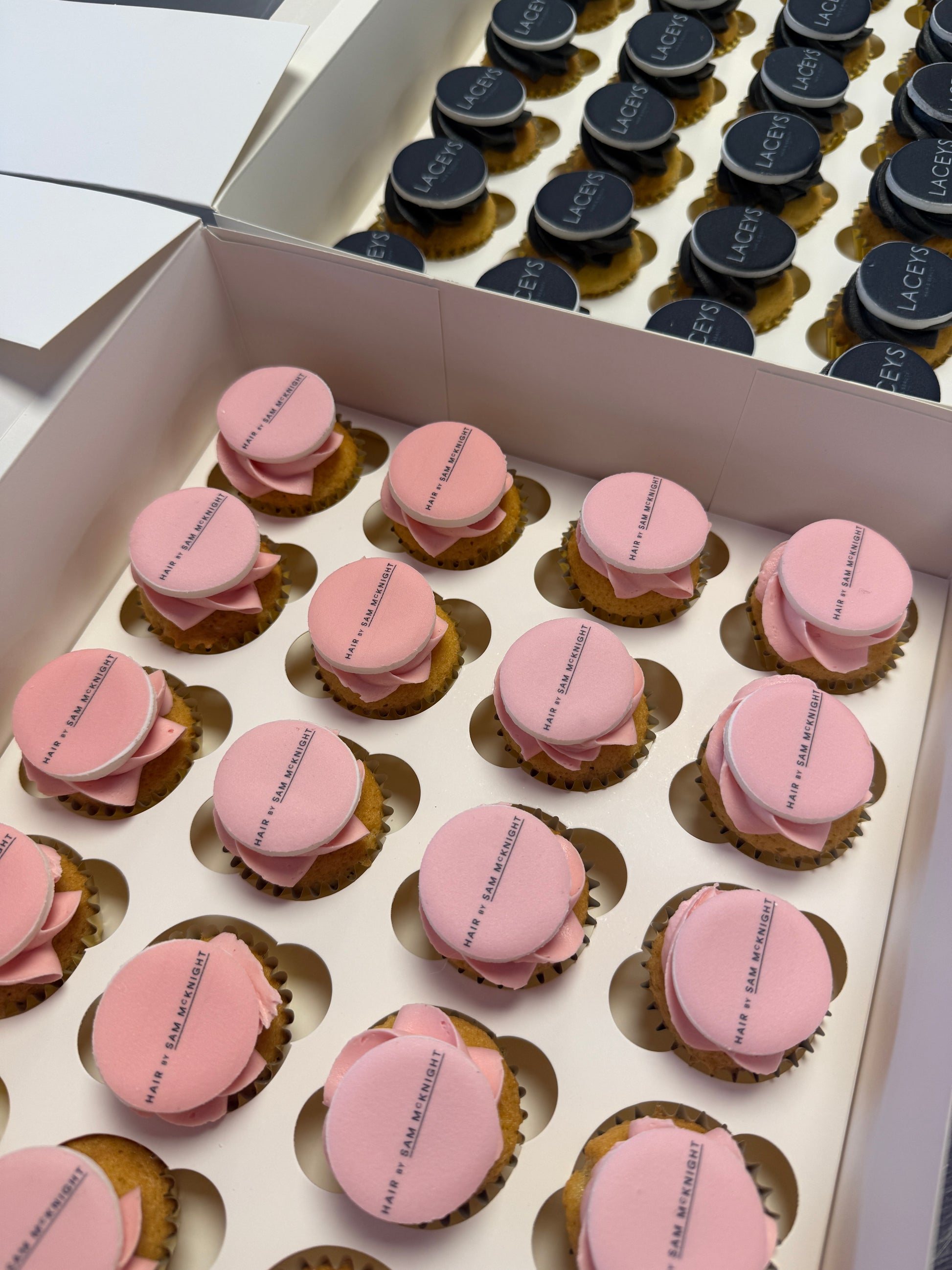 Five boxes of 24 branded mini cupcakes for corporate events