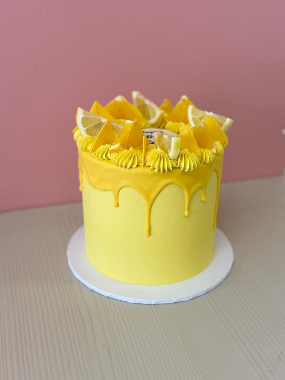 Short Drip cake with ganache drip in chosen colour
