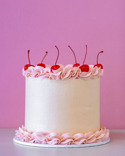 The Regal Cherry cake with cherry and chocolate decoration